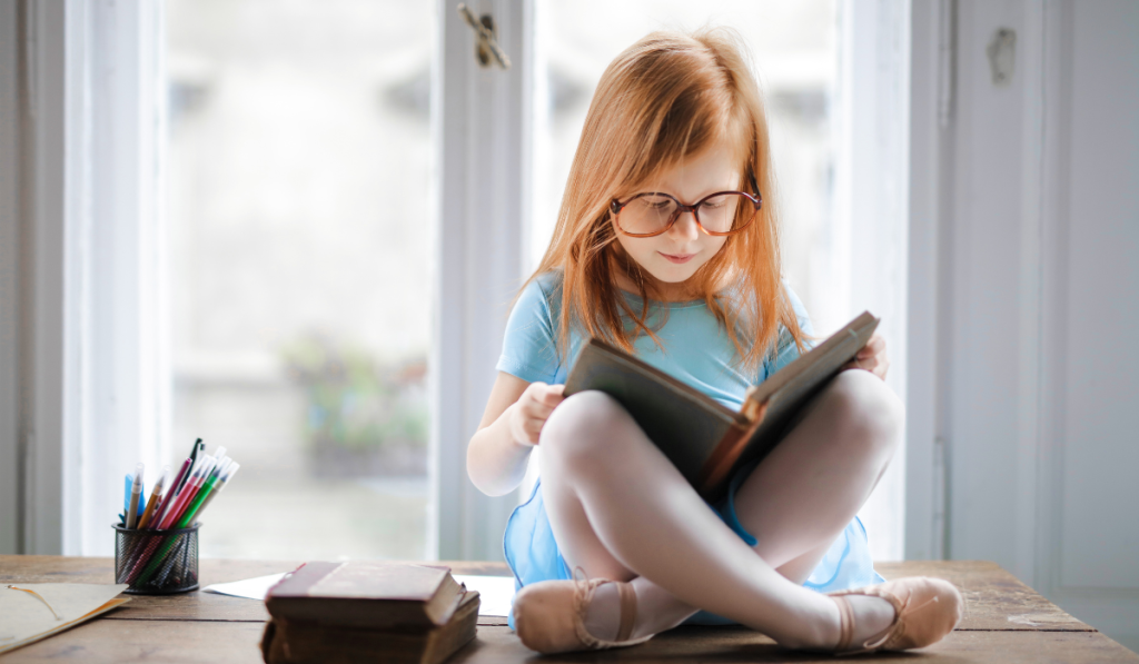 child reading a book for a school fundraiser